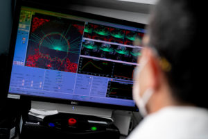 Researcher looking at computer screen