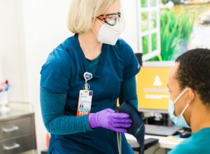 nurse taking a patient's blood pressure