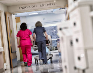 Providers walking toward endoscopy unit