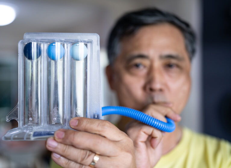 man taking breathing test