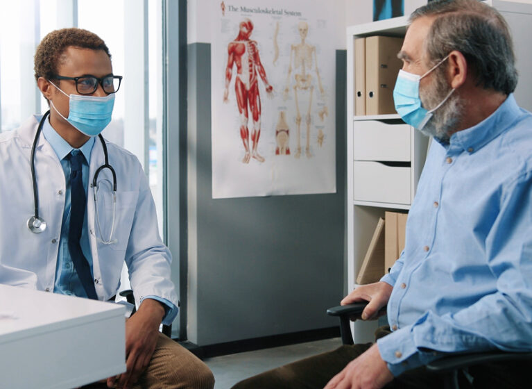 doctor talking with patient