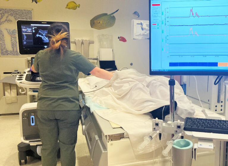 ultrasound tech conducts ceVUS urodynamic study