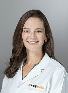 Neonatologist Brynne Sullivan in white coat